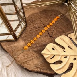 Pulsera happy face naranja neon + pintura chapa de oro 18k